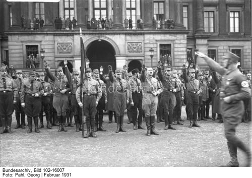 Adolf Hitler reviewing a Party rally in Braunschweig